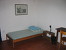 1. Schlafzimmer Gruppenhaus Passignano