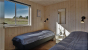 1. Schlafzimmer Grenaa Kaempehus